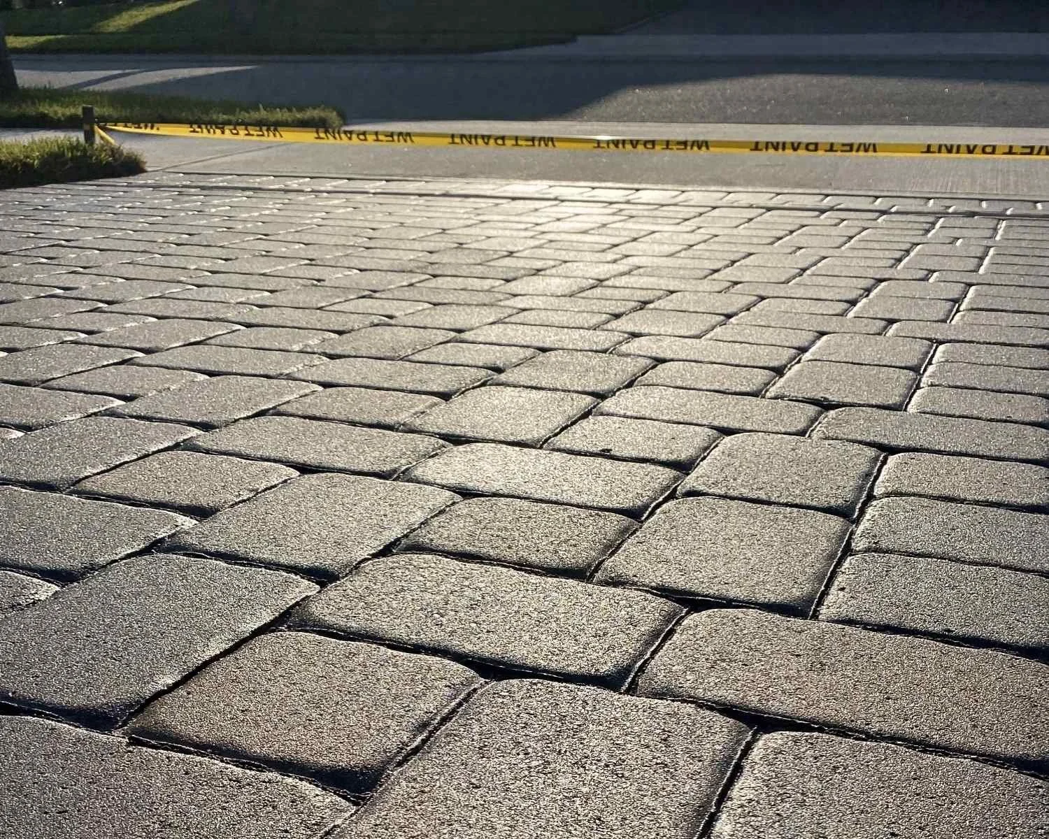 Paver surface prepared for sealing with joint areas visible in Broward County