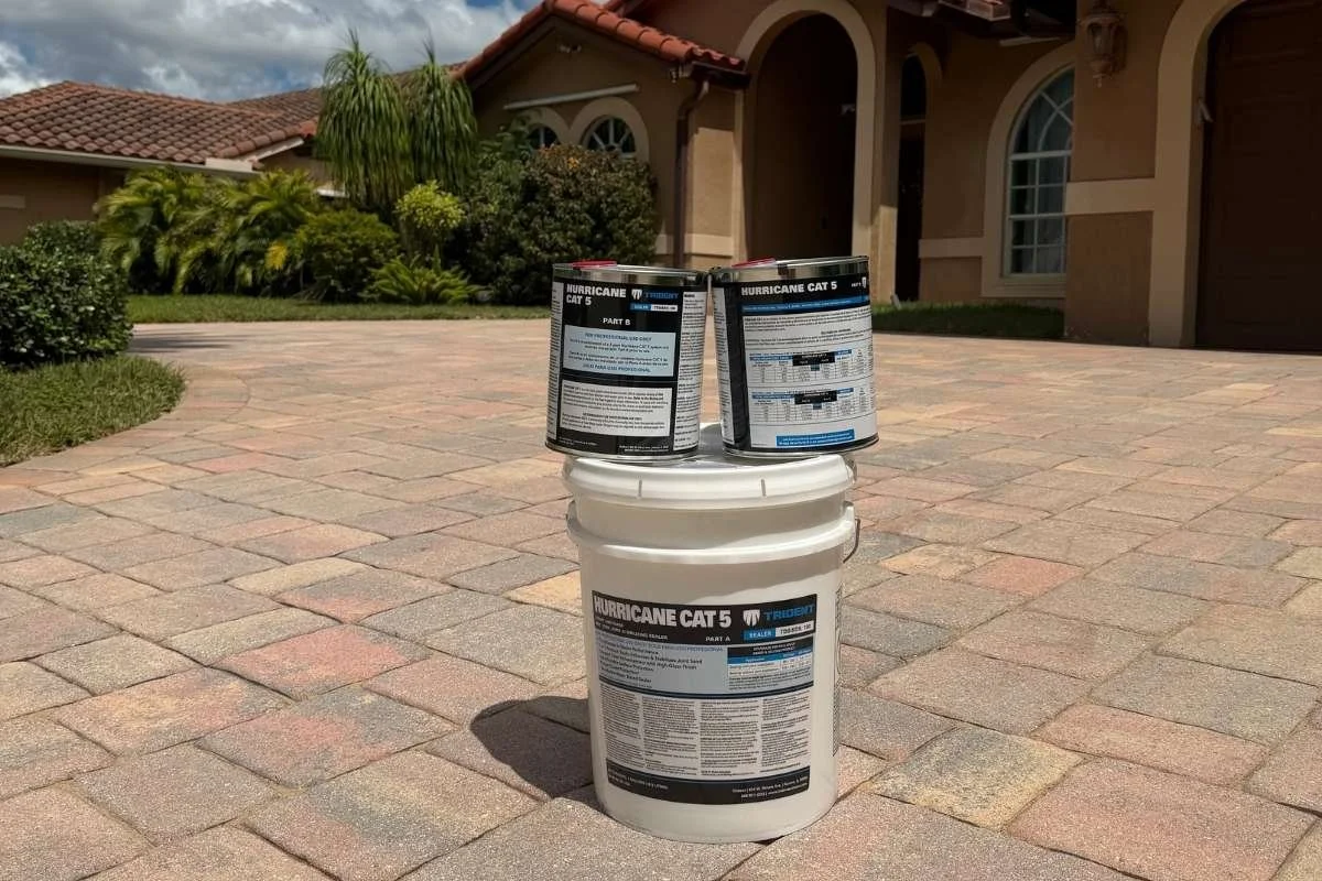 Joint-stabilizing paver sealer used during a Coral Springs driveway cleaning and sealing project.