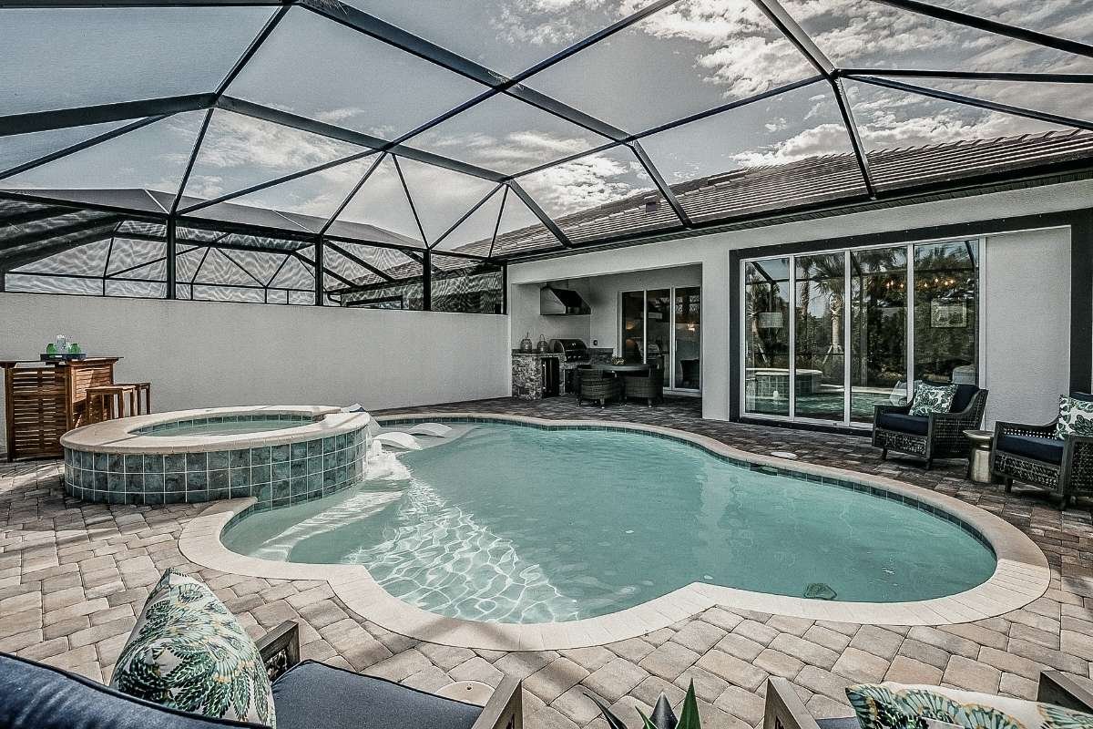 Coordinated exterior surface care for a residential pool area, patio, and screen enclosure in Broward County.