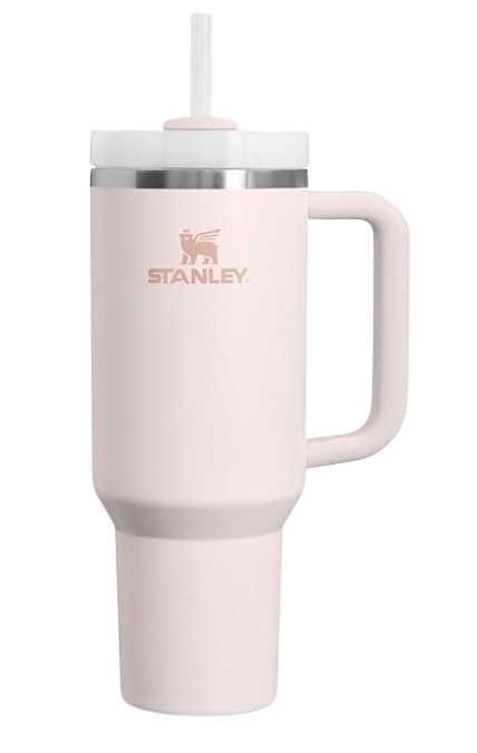 A white Stanley insulated travel mug with a handle and a lid, featuring the Stanley logo.