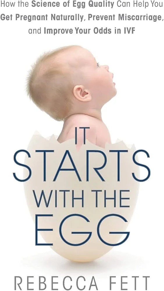 Cover of a book titled "It Starts with the Egg" by Rebecca Fett, featuring a baby emerging from a cracked eggshell with text about egg quality and pregnancy health.