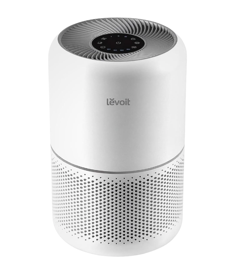 A white Levoit air purifier with a circular black control panel on top, featuring touch controls and a perforated lower section for air filtration.