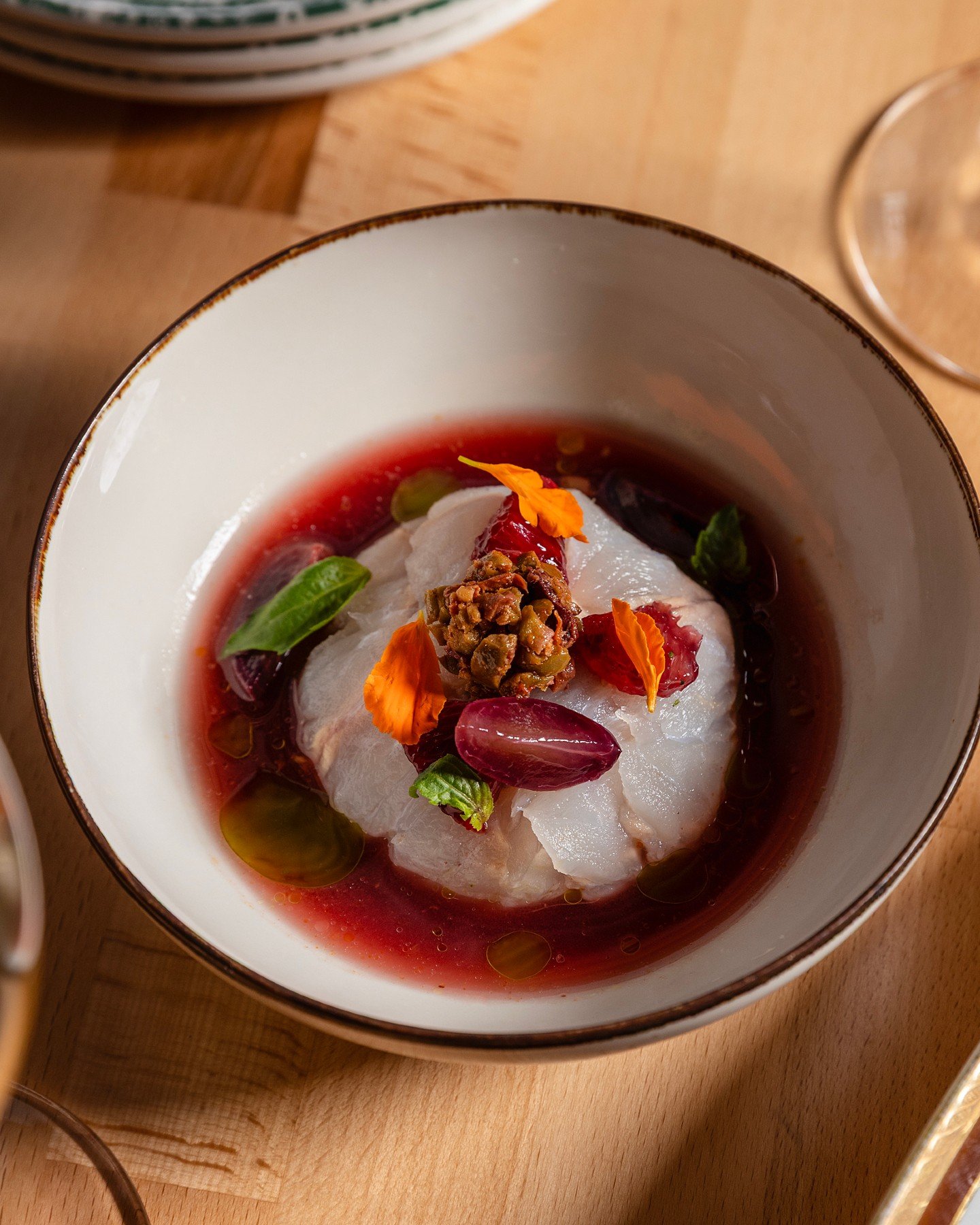 A handful of seats left for our wine dinner next Thursday with Alberto Cordero di Montezemolo at Marrow in the Market. Here's a look at two of the four courses.

Hamachi crudo with elderberry vinaigrette, mandarin segments, olive tapenade, and marigo