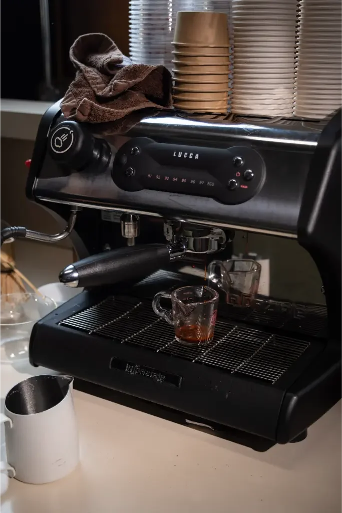 Espresso pulling on the commercial La Spaziale machine