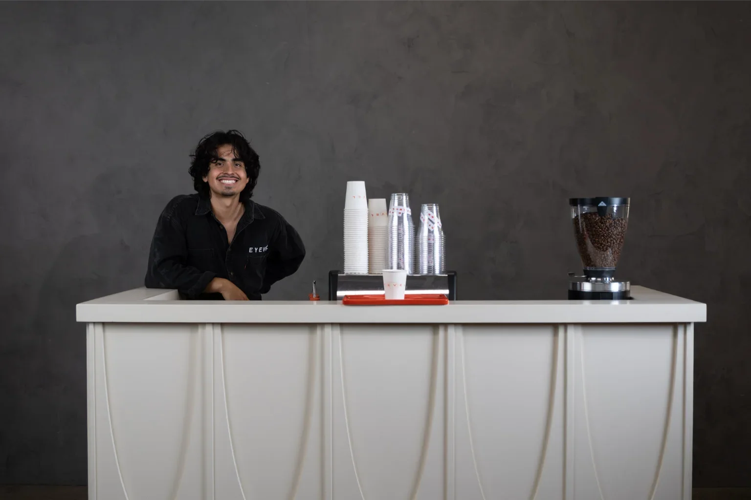 Levi, Eyevel&rsquo;s owner-barista, behind the midcentury coffee cart