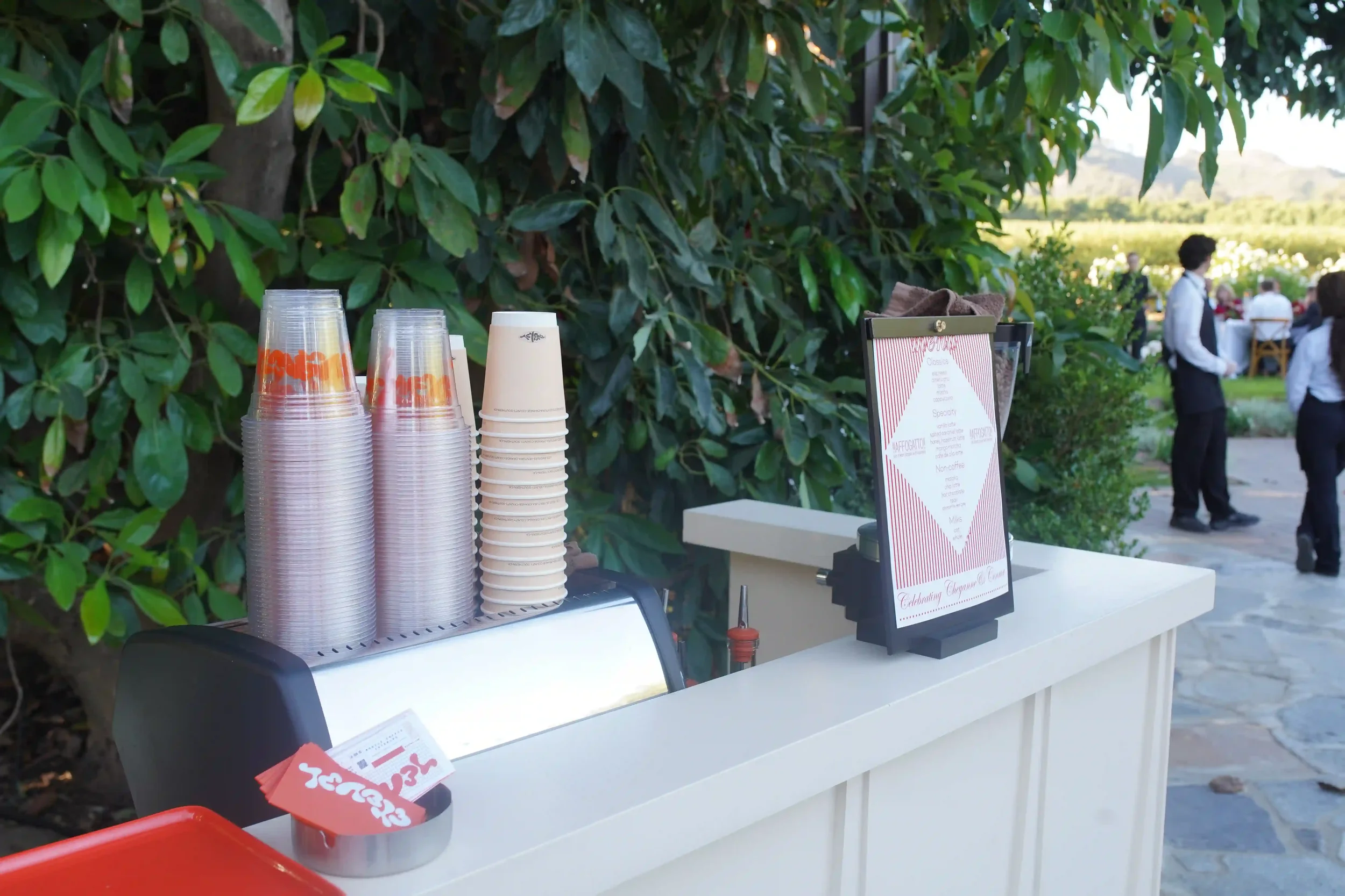 Branded cups and the menu card staged on the cart