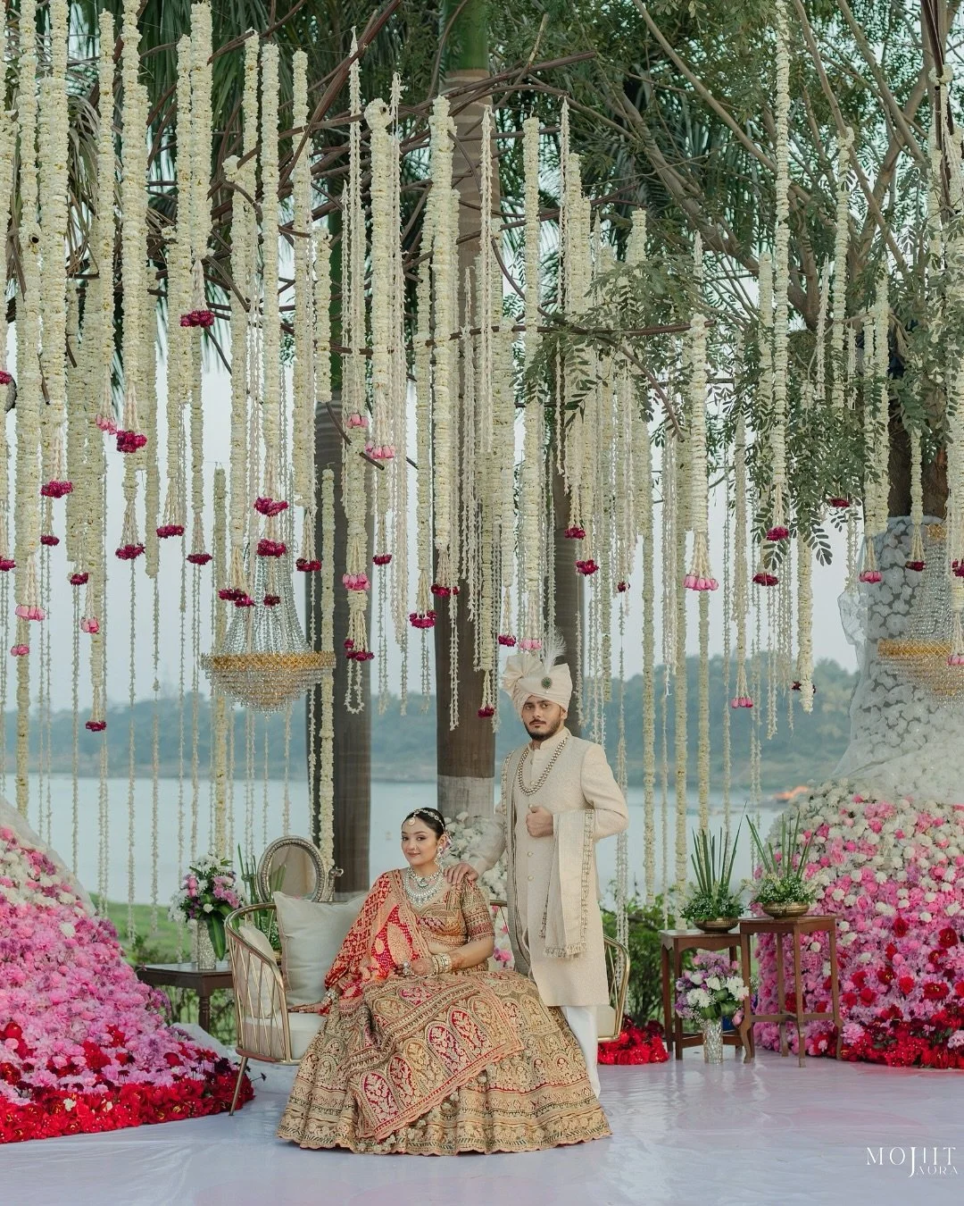 Each detail be it the mandap draped in dreams, tears of joy, or the quiet whispers of love radiated an essence so pure, that it felt like the universe held its breath to witness their union. 

Bride: @shivani_kotadia 
Groom:- @nishvall
MUA : @sejal_s