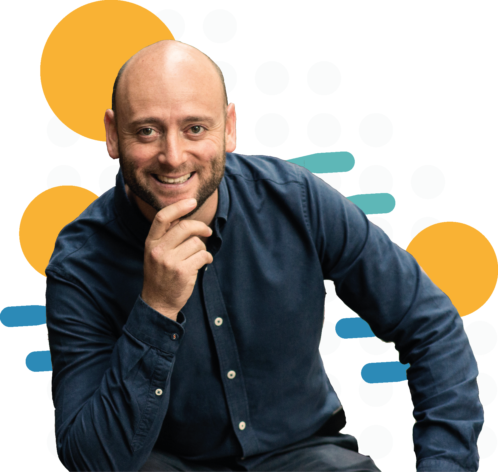 A smiling man with a beard and bald head, wearing a dark blue shirt, sitting and resting his chin on his hand, with speech bubbles in the background.