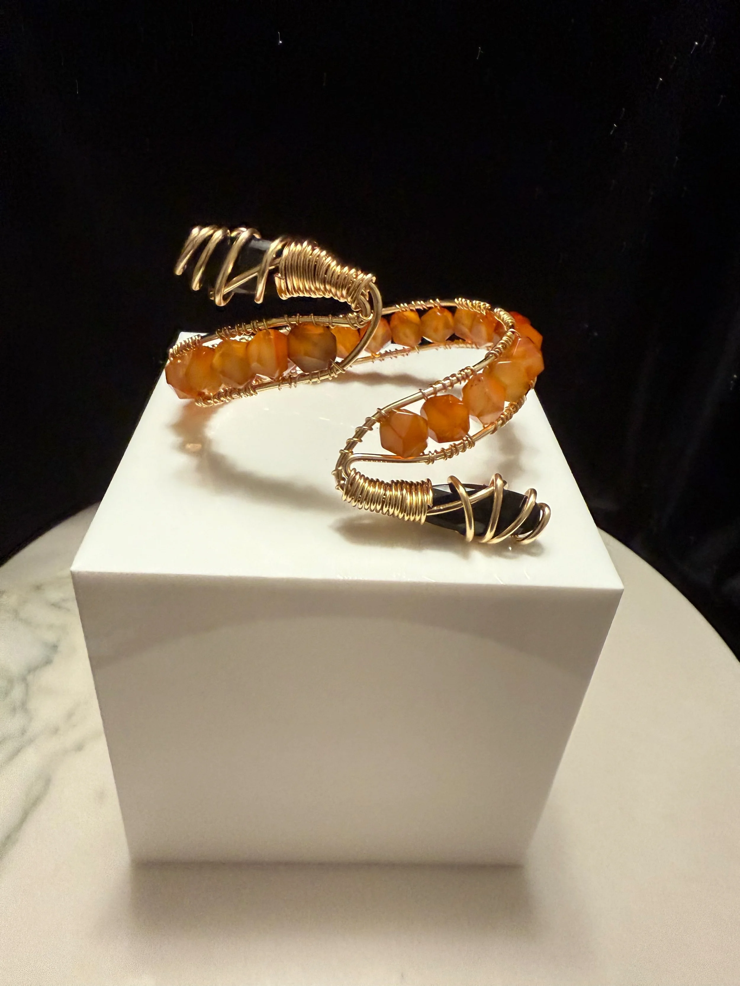 Orange.black cuff pic1 9.22.25 - 1.jpeg