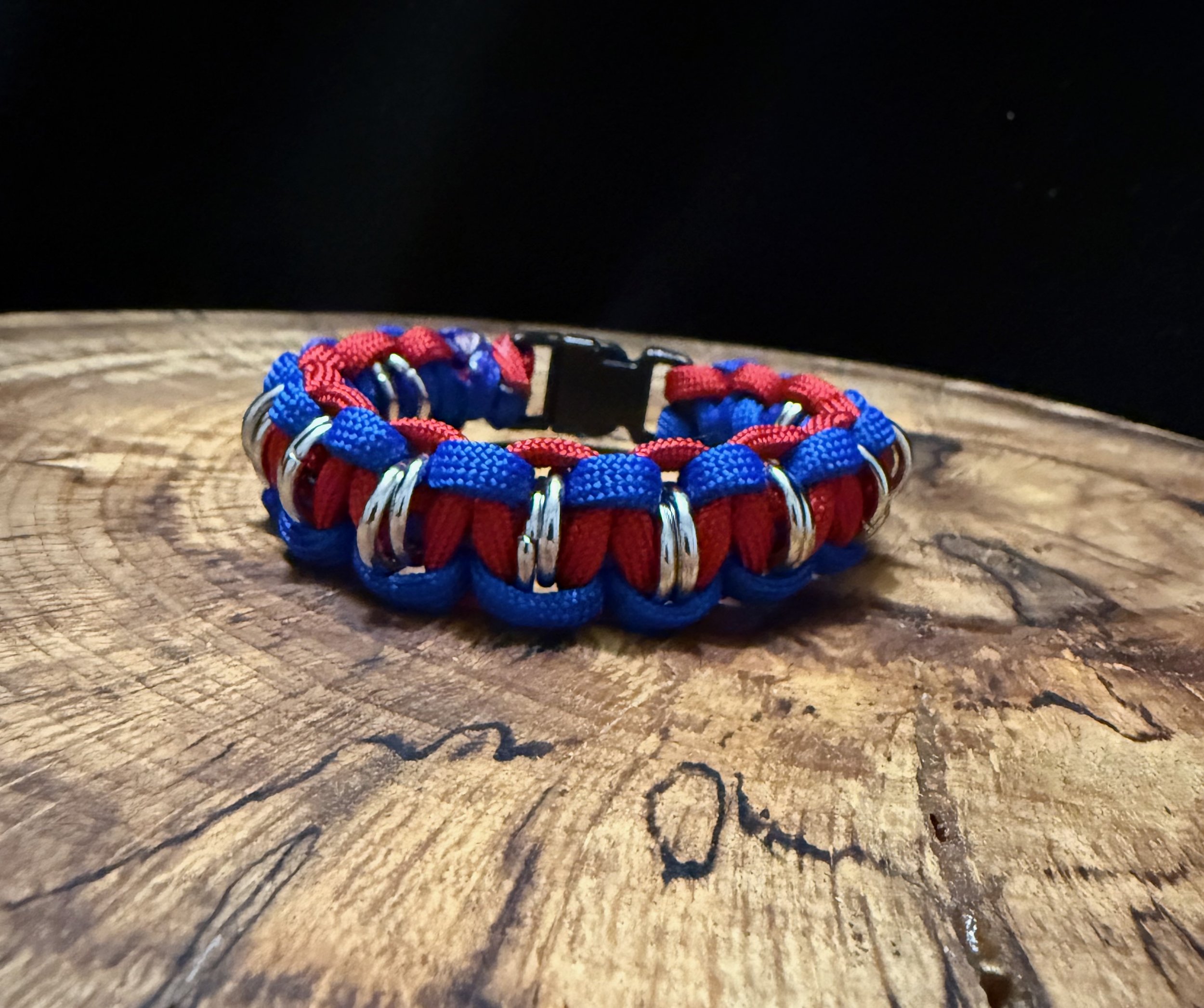 Suerte' jump ring paracord bracelet red & blue pic 2 1-4-26 - 1.jpeg