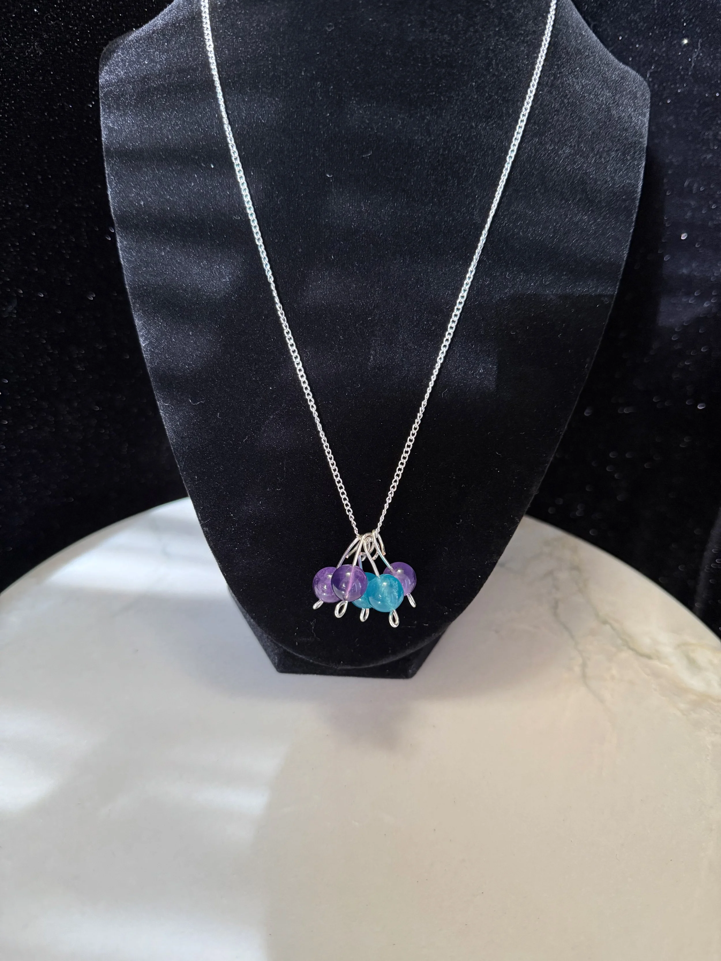 PEACOCK FIDGET NECKLACE