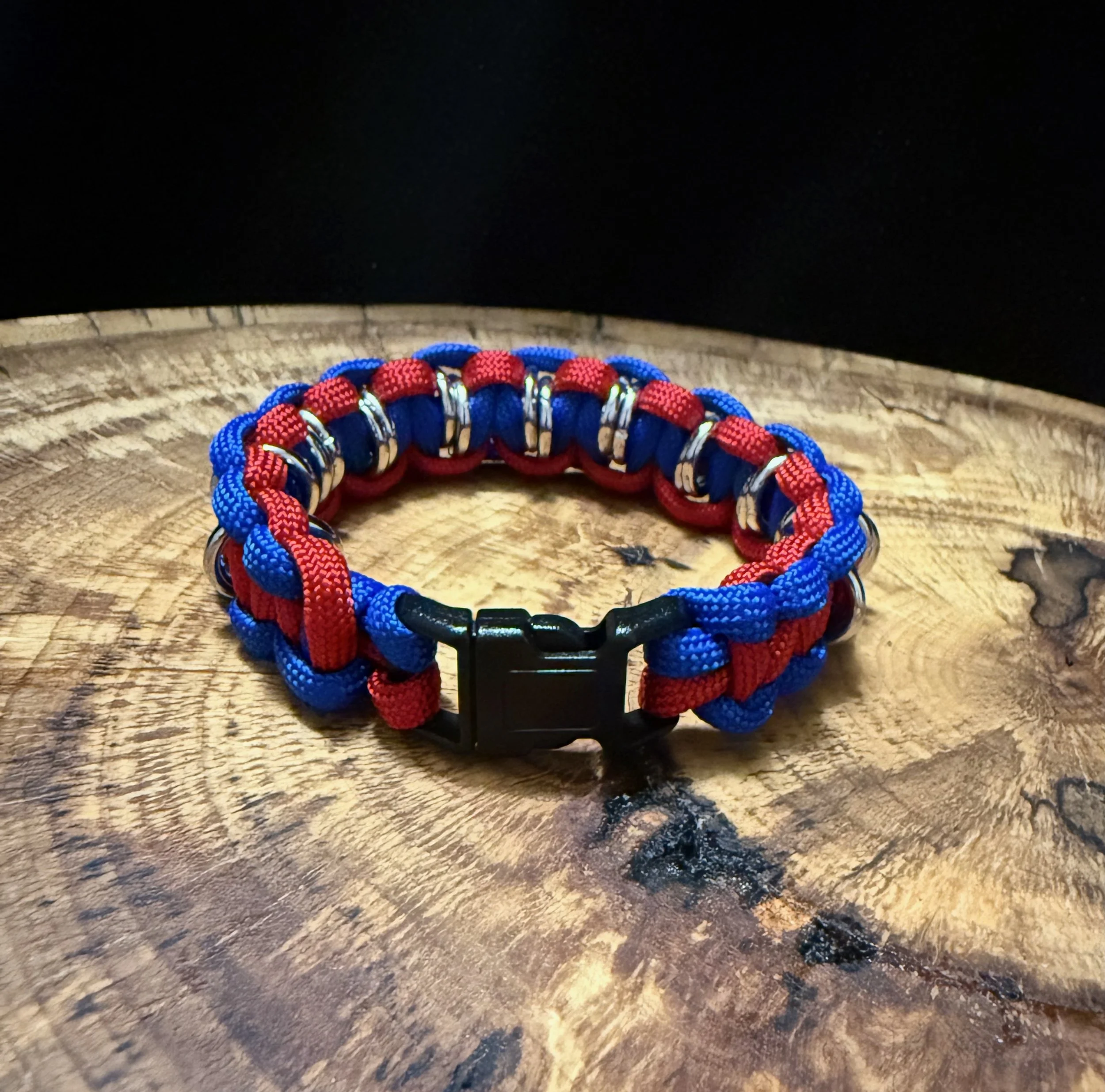 Suerte' jump ring paracord bracelet red & blue pic 1 1-4-26 - 1.jpeg