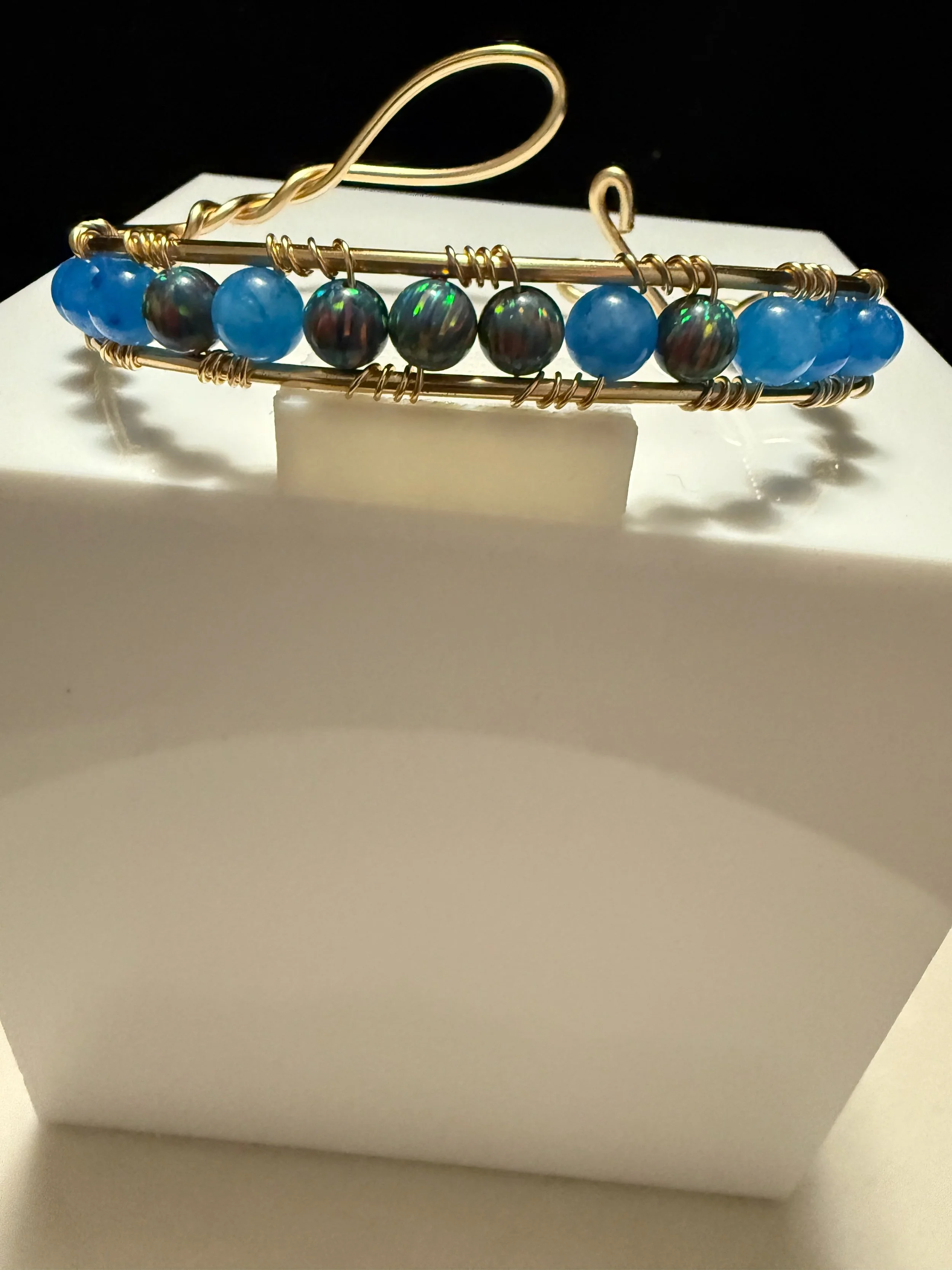 Rainbow Flame Cuff#2 pic 1 11.25.25 - 1.jpeg