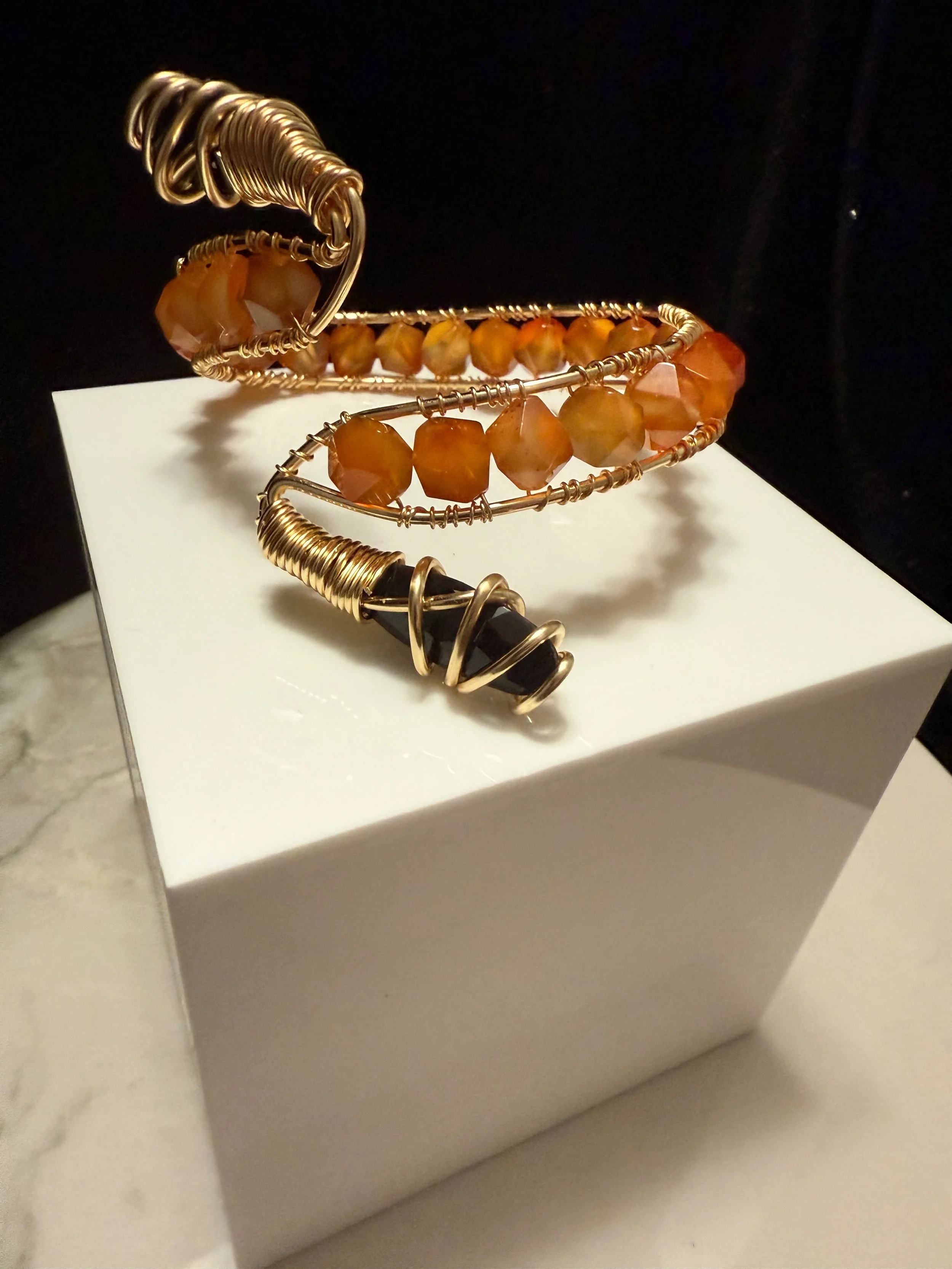 Orange.black cuff pic2 9.22.25 - 1.jpeg