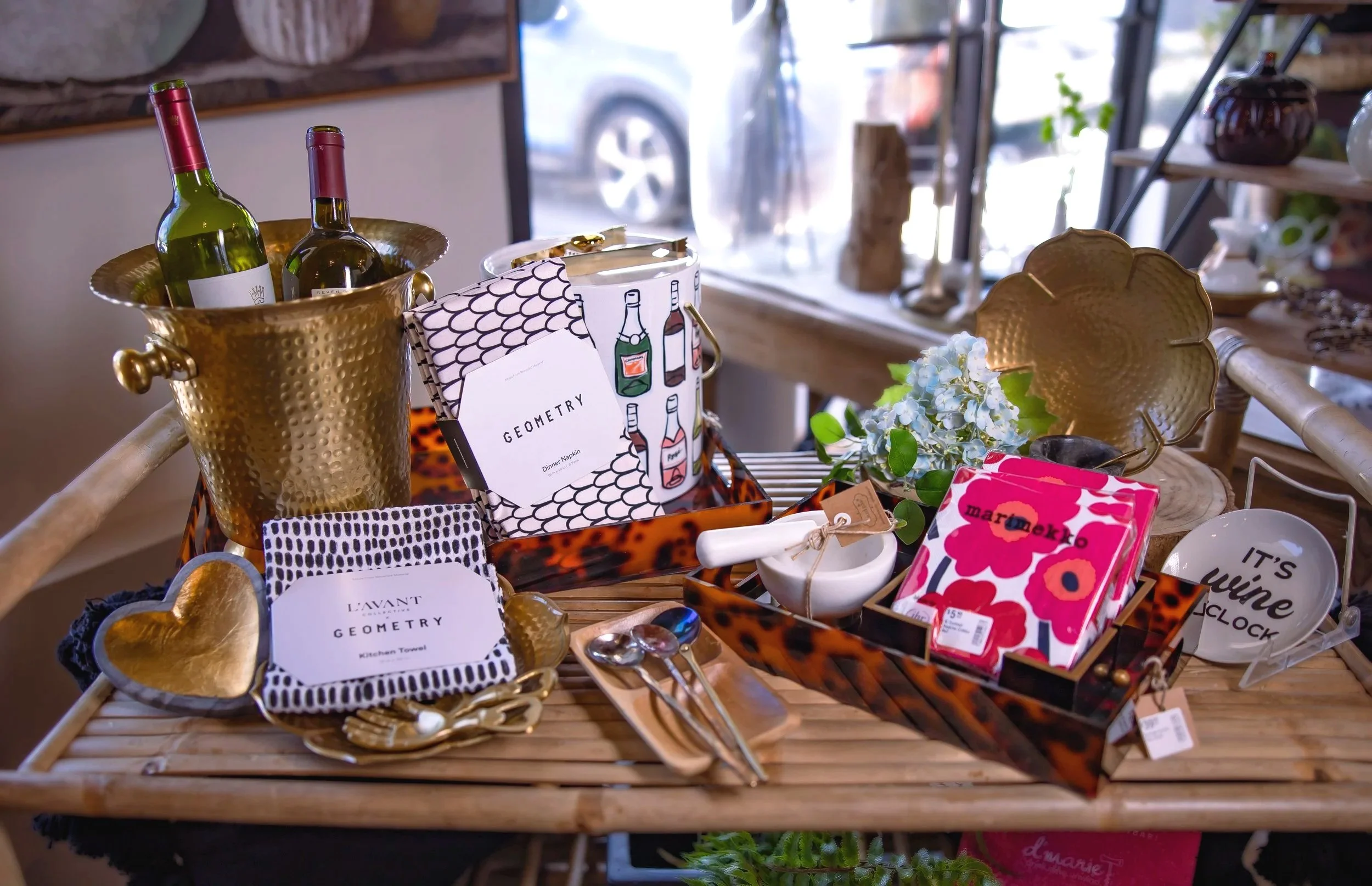 Table With Napkins, Champagne Bucket and Wine and Spoons