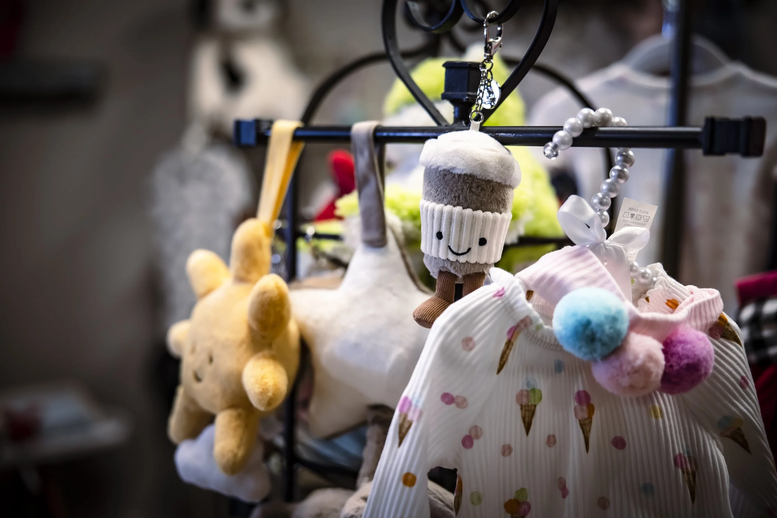 Baby toys and clothing displayed
