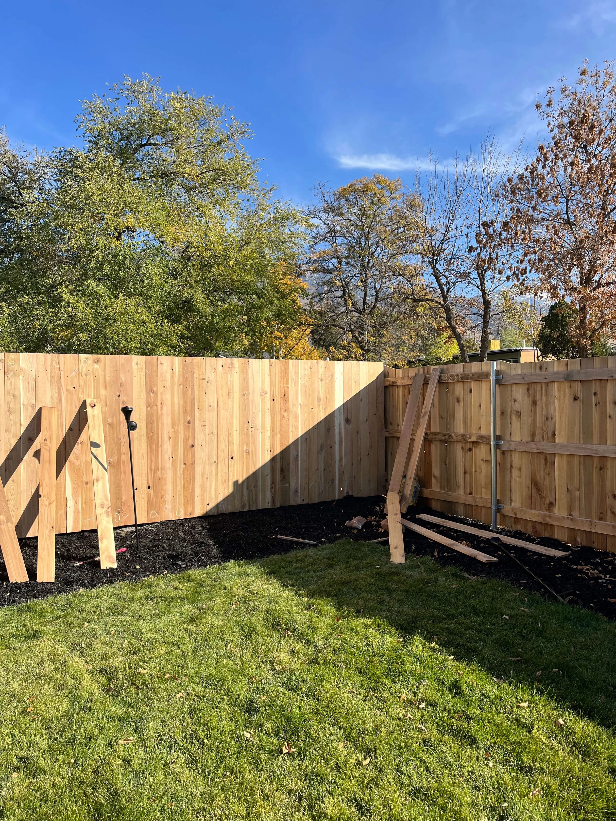 Wood fence installed in a residential backyard in Salt Lake City