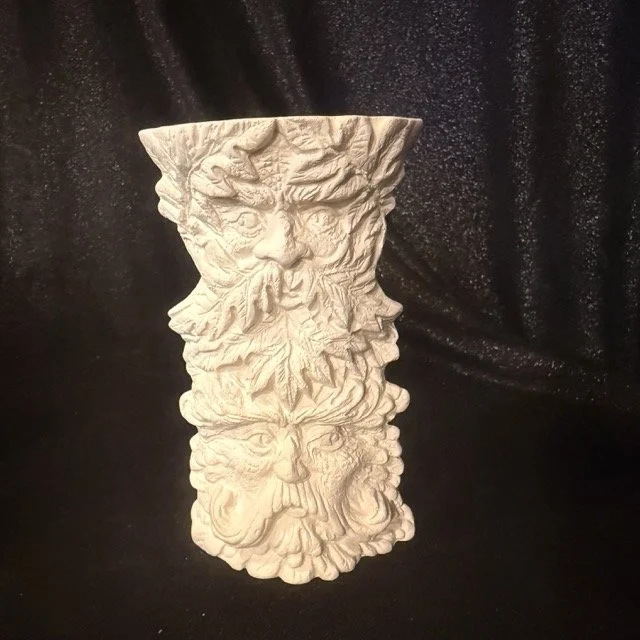 Green Men Pillar.jpeg