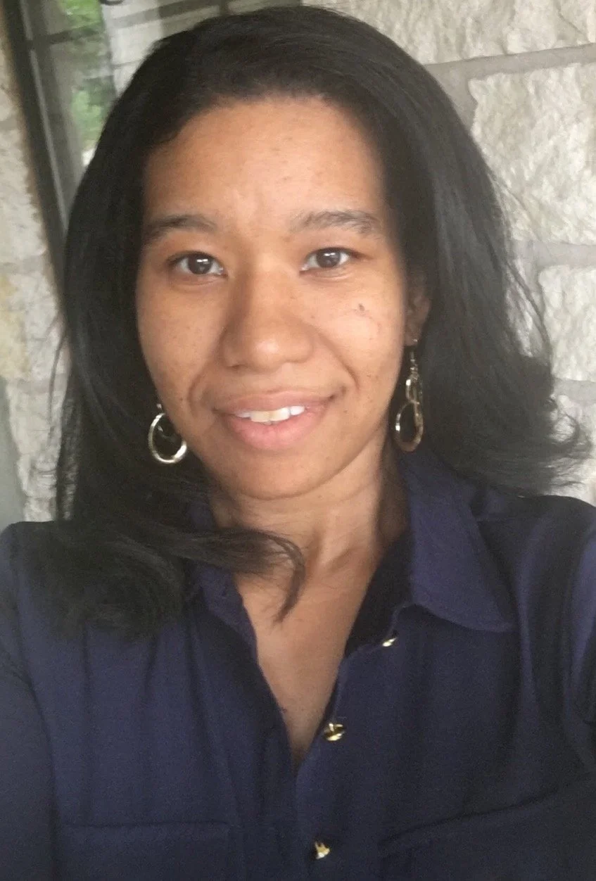 Picture of Denise Wagner owner of Elora Atelier, wearing a navy blue shirt