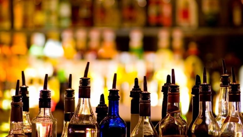 Liquor bottles at a bar.