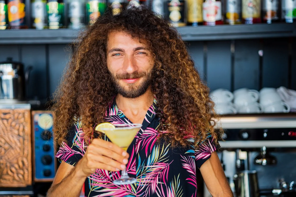 A bartender making delicious craft cocktails.