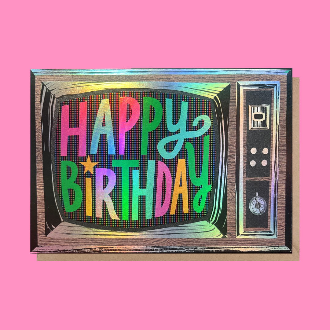 A colorful illustration of a vintage television with the words 'Happy 2nd Birthday' on the screen, set against a pink background.