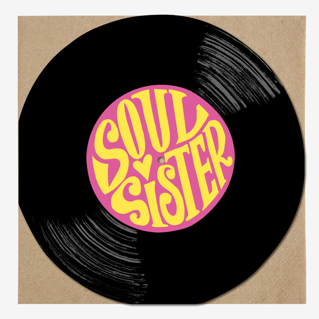 A vinyl record with a pink and yellow label that reads 'Soul Sister' in a stylized, psychedelic font.