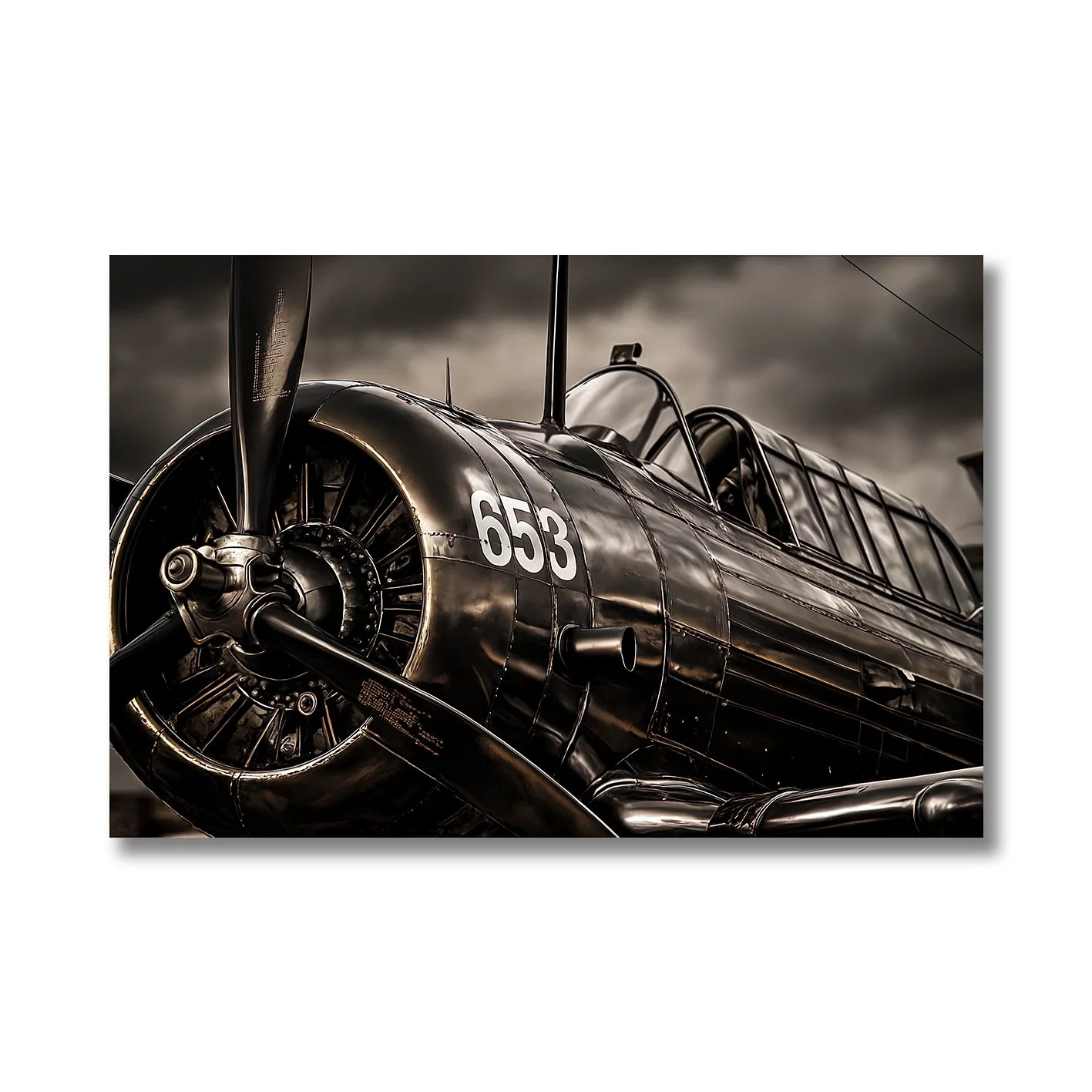 close-up metallic photograph of aircraft engine and fuselage with high contrast finish