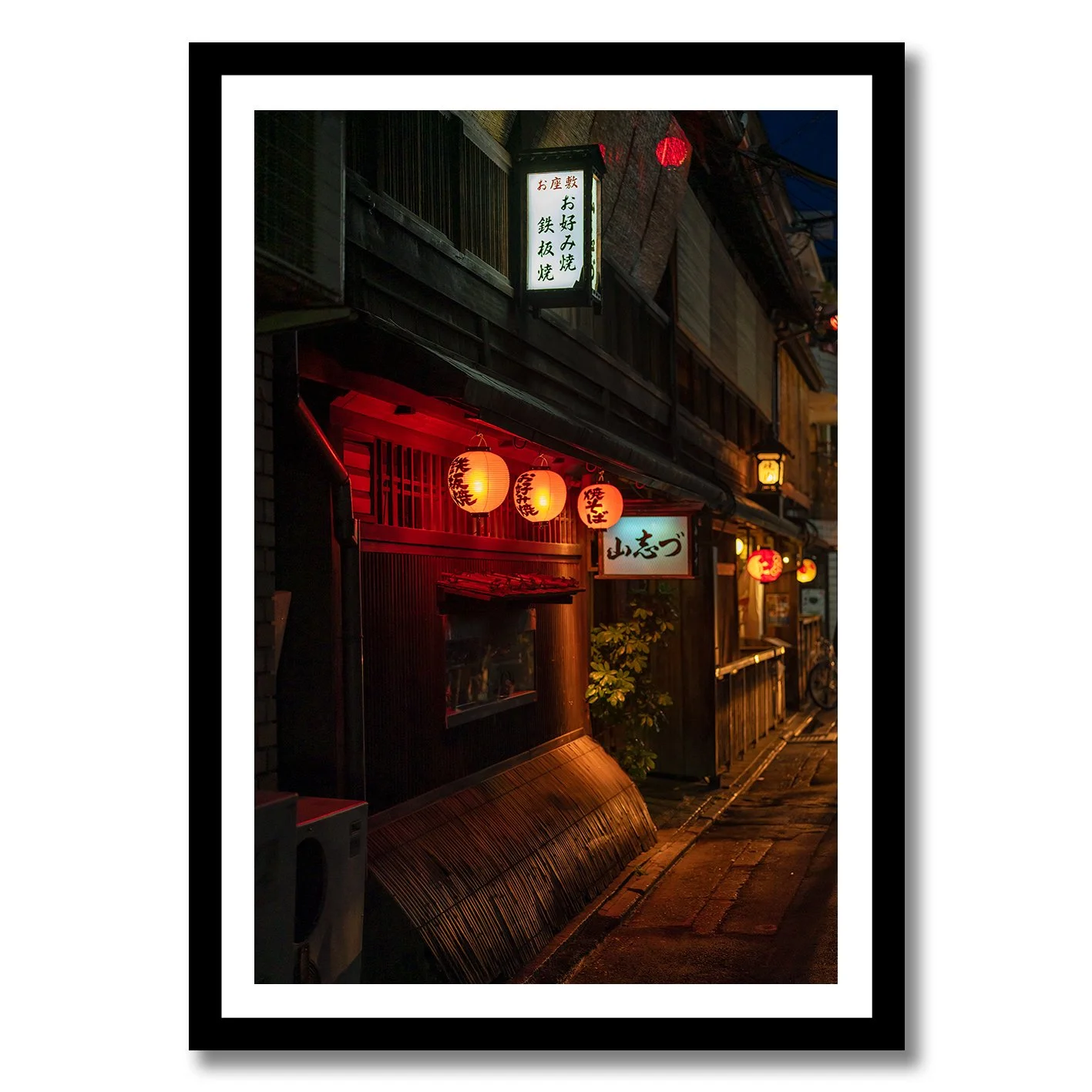 Tokyo night street photograph with glowing red lanterns and traditional buildings