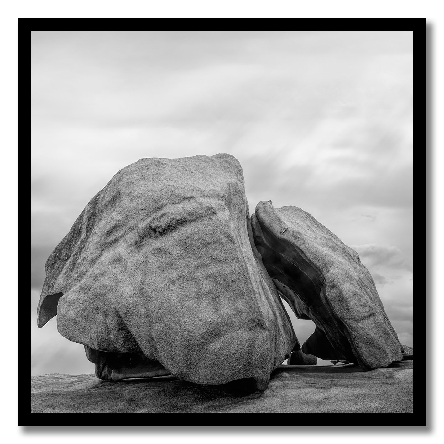 black and white photograph of weathered granite rock formation in australia