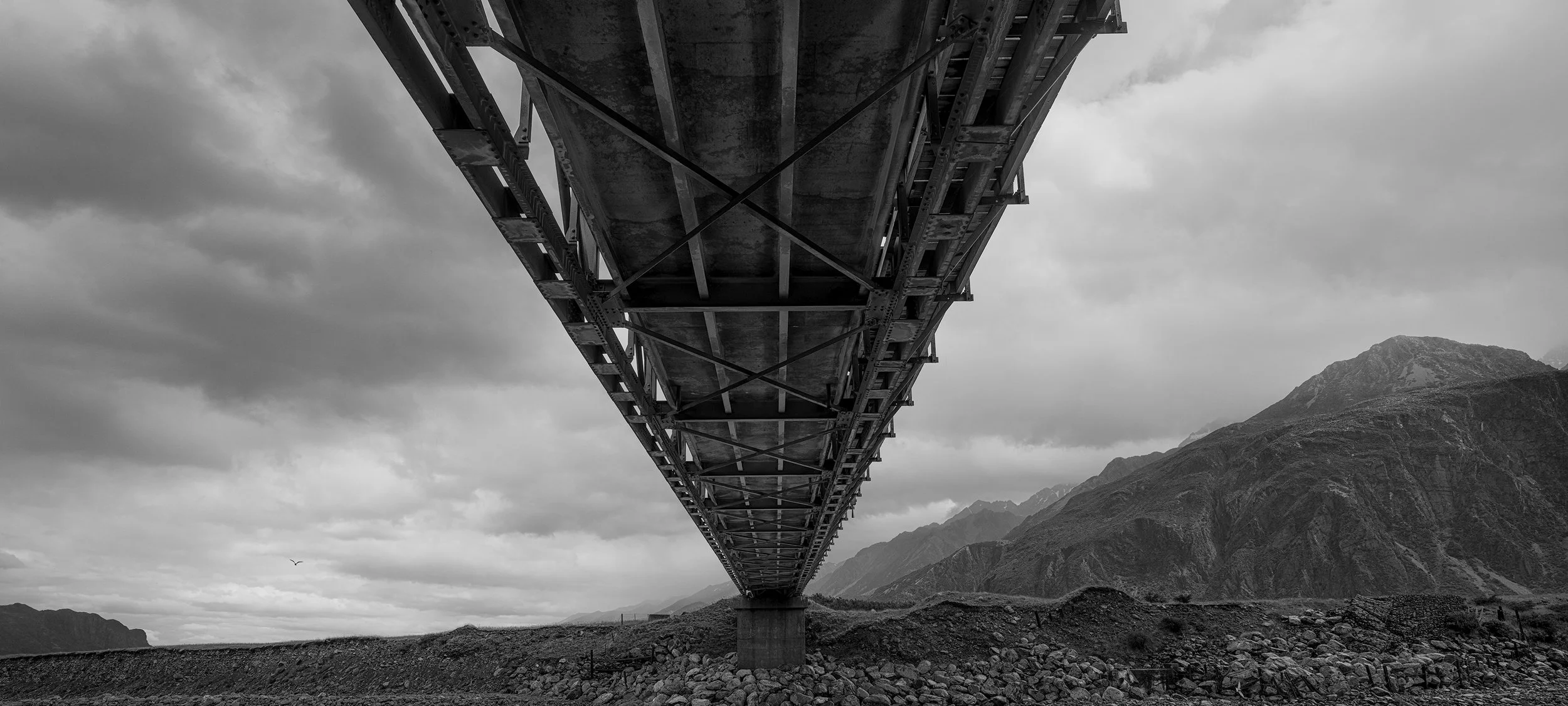 tasman-valley-road-bridge-new-zealand-black-and-white-fine-art-photography-nick-psomiadis.jpg
