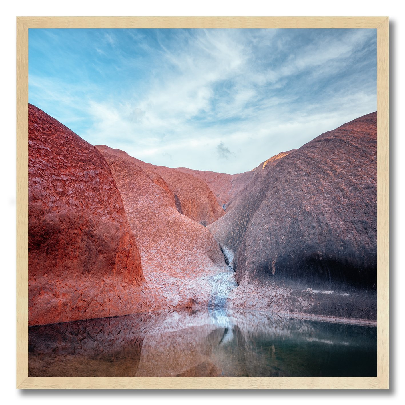 photograph of mutitjulu waterhole at uluru with reflections on still water