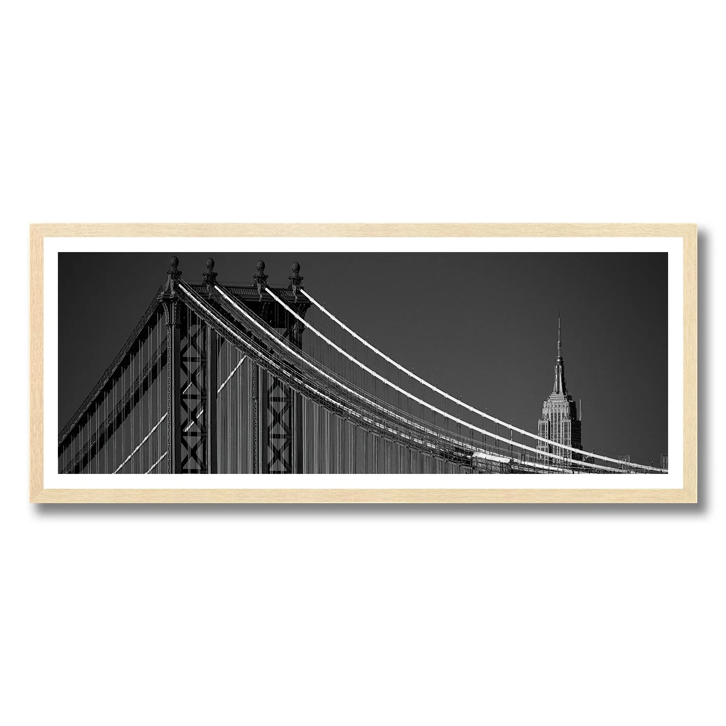 Black and white panoramic photograph of Manhattan Bridge and Empire State Building