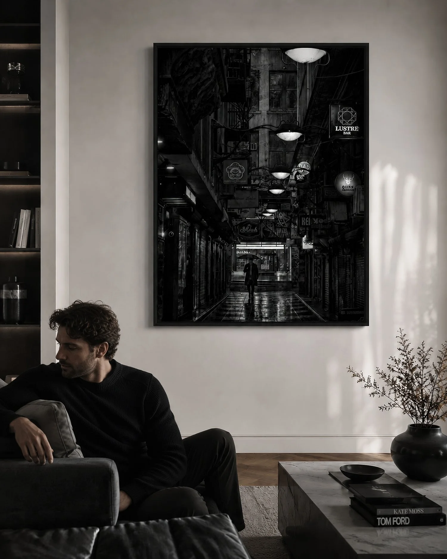 Modern living room mock-up with a black and white laneway canvas print on the wall and a seated man looking away, by Nick Psomiadis at NIKART Studio and Gallery