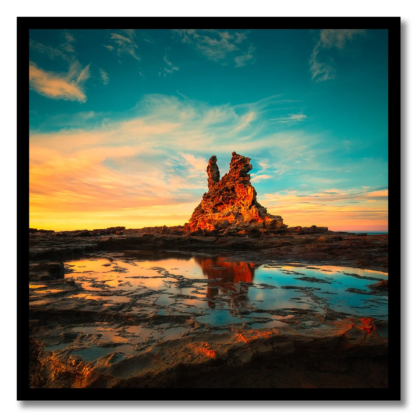 sunset photograph of rock formation and tidal pool at cape paterson