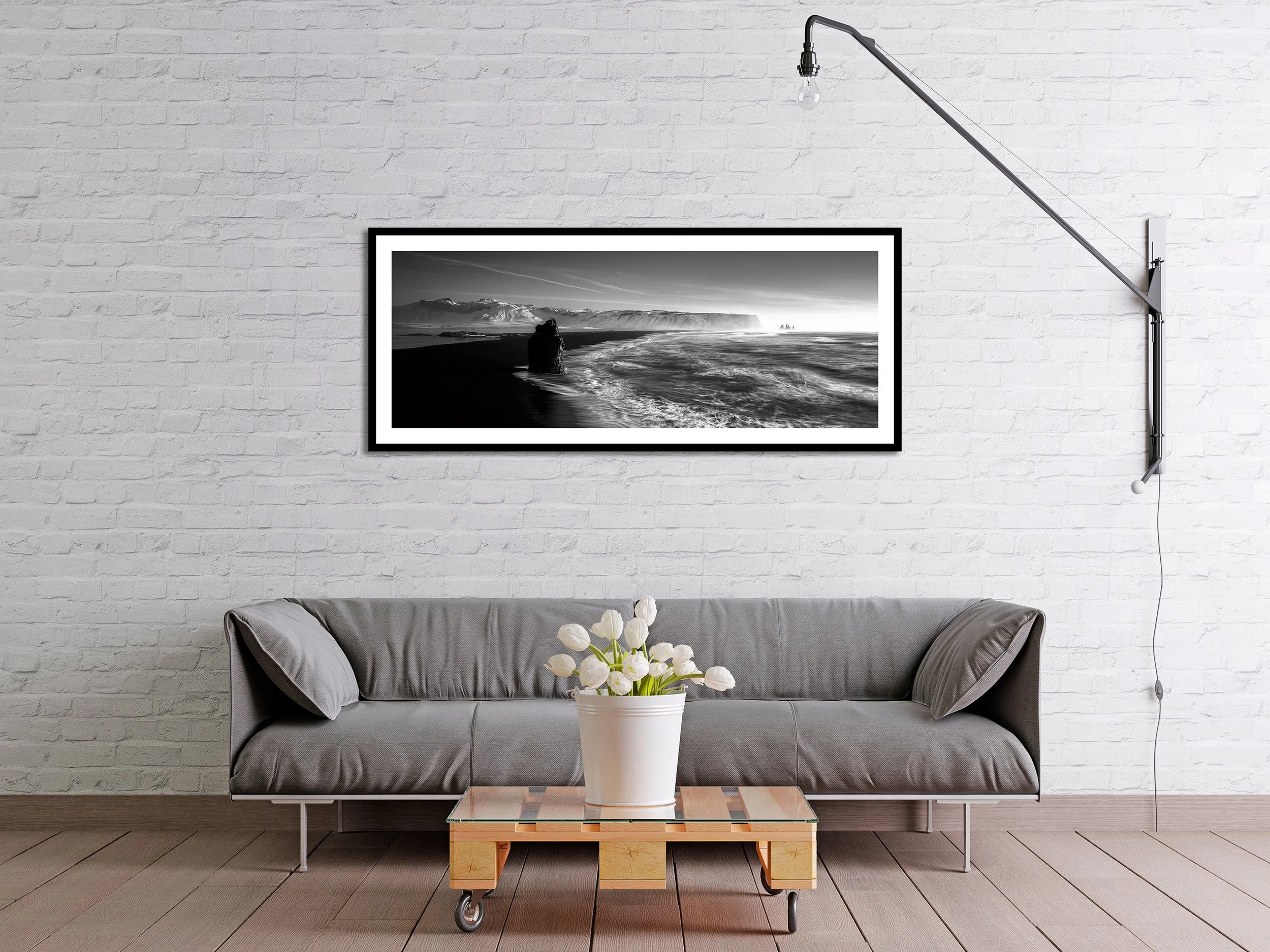Black and white fine art photograph of Reynisfjara Beach waves and cliffs in Iceland