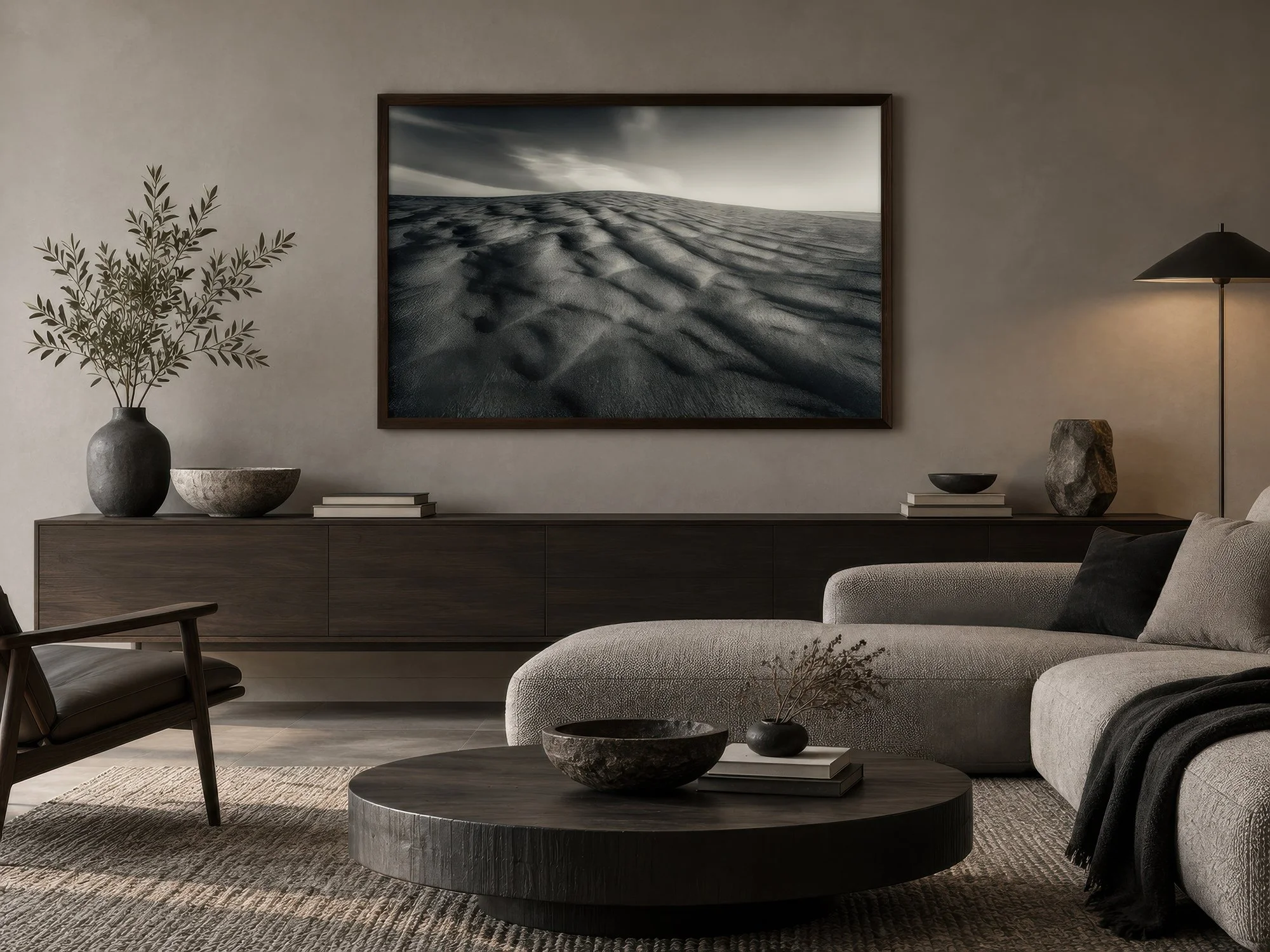 Framed Sand Currents black and white sand dune photograph in a refined minimalist lounge with neutral furnishings, by Nick Psomiadis at NIKART Studio and Gallery