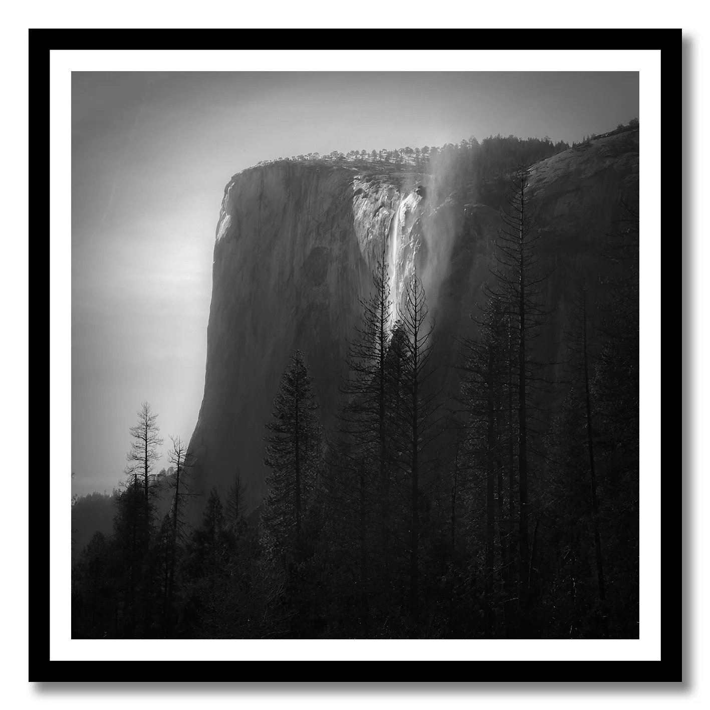 Black and white fine art photograph of Horsetail Falls waterfall in Yosemite National Park
