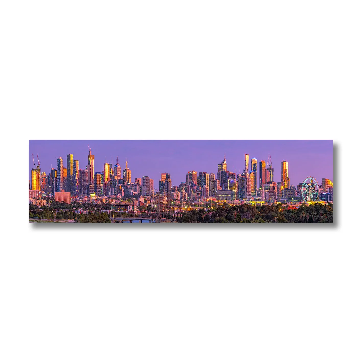 Melbourne skyline photograph at dusk glowing in soft purple light