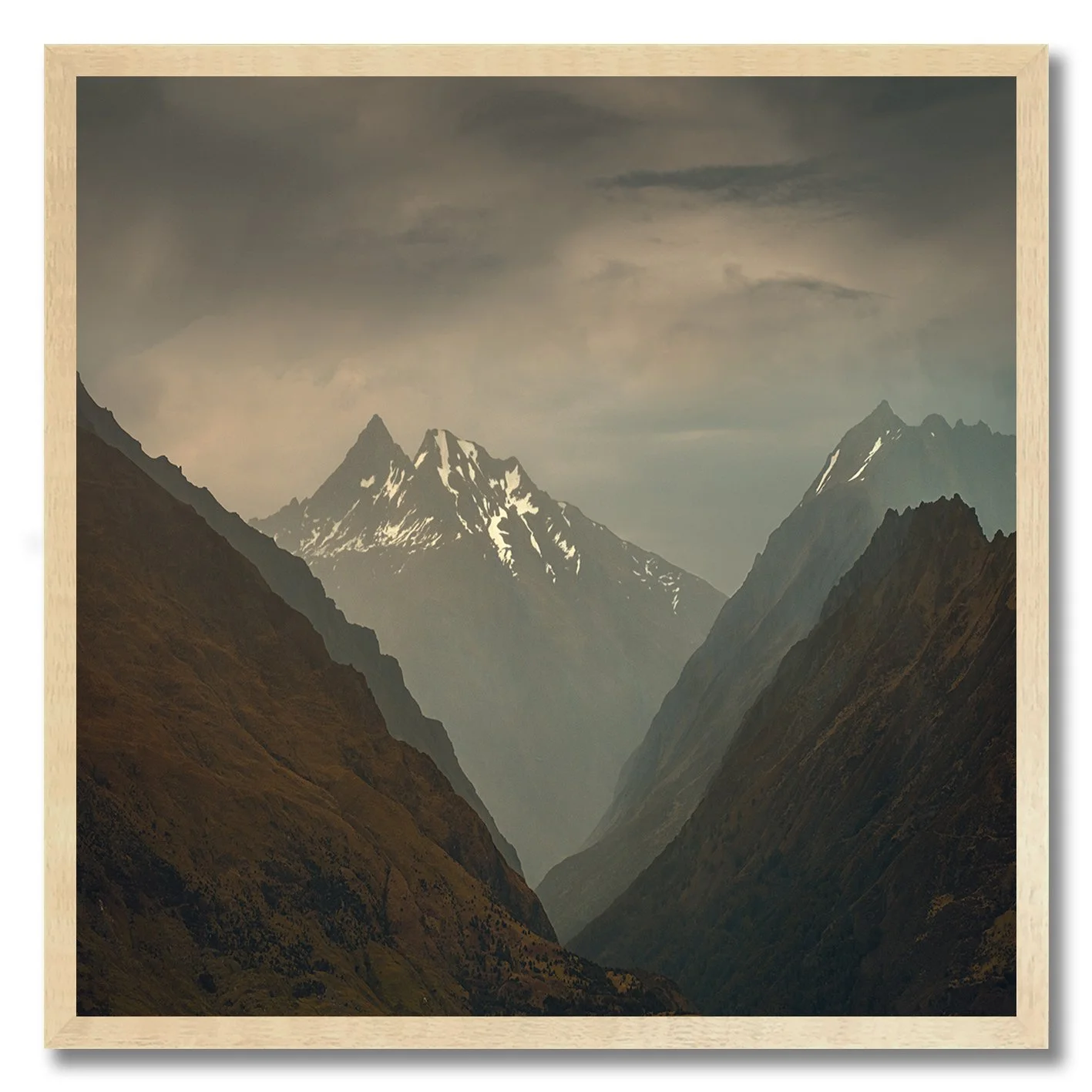 Mountain valley photography with snow peaks in New Zealand