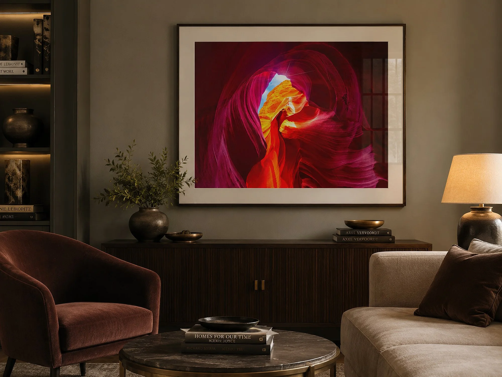 Framed Antelope Canyon photograph displayed behind reflective glass in an elegant contemporary living room with warm neutral décor.
