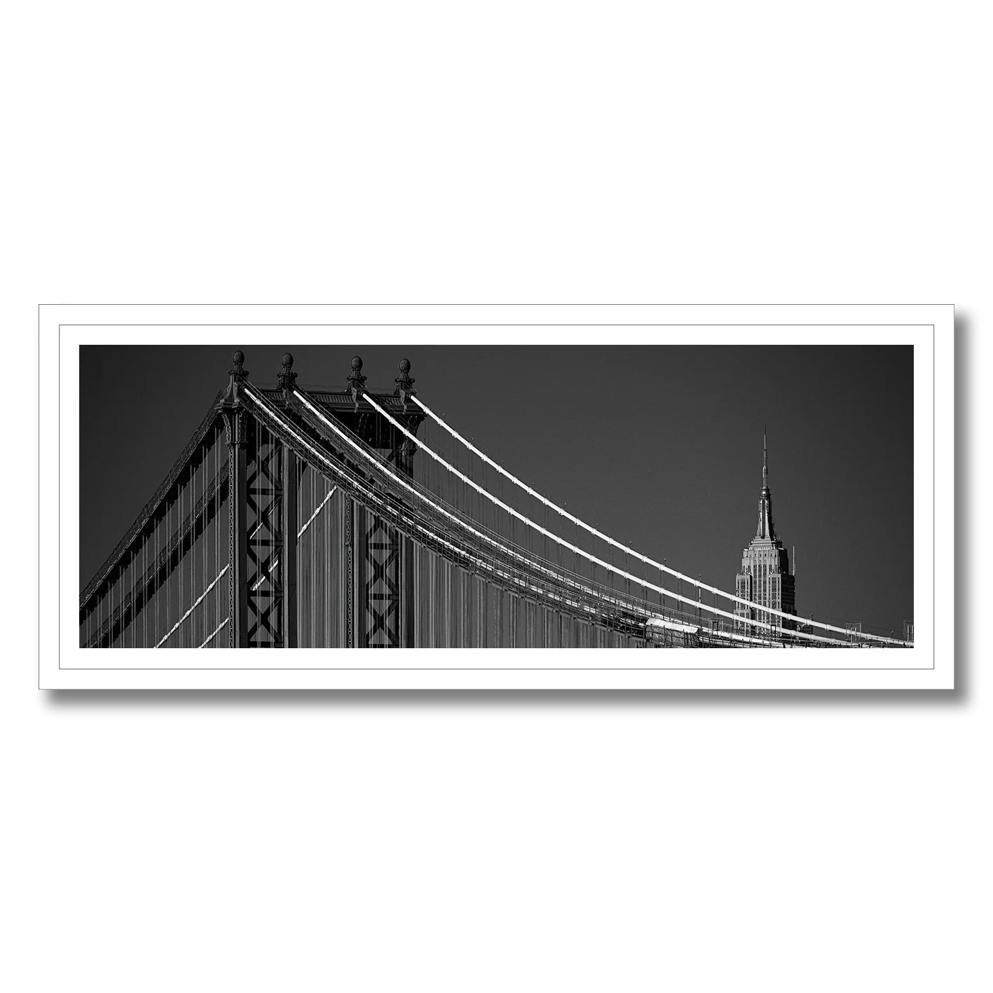Black and white panoramic photograph of Manhattan Bridge and Empire State Building