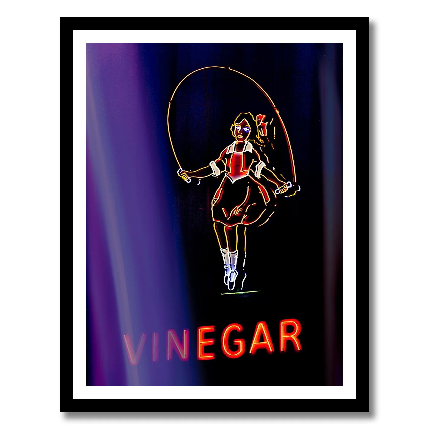 Neon photograph of Skipping Girl sign behind purple curtain light