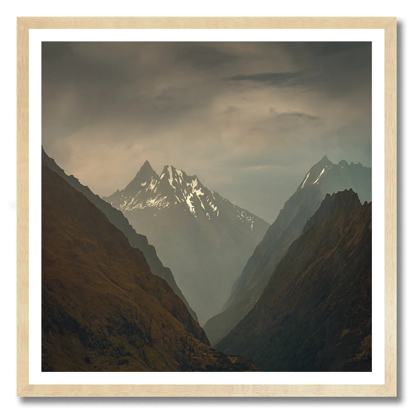 Mountain valley photography with snow peaks in New Zealand