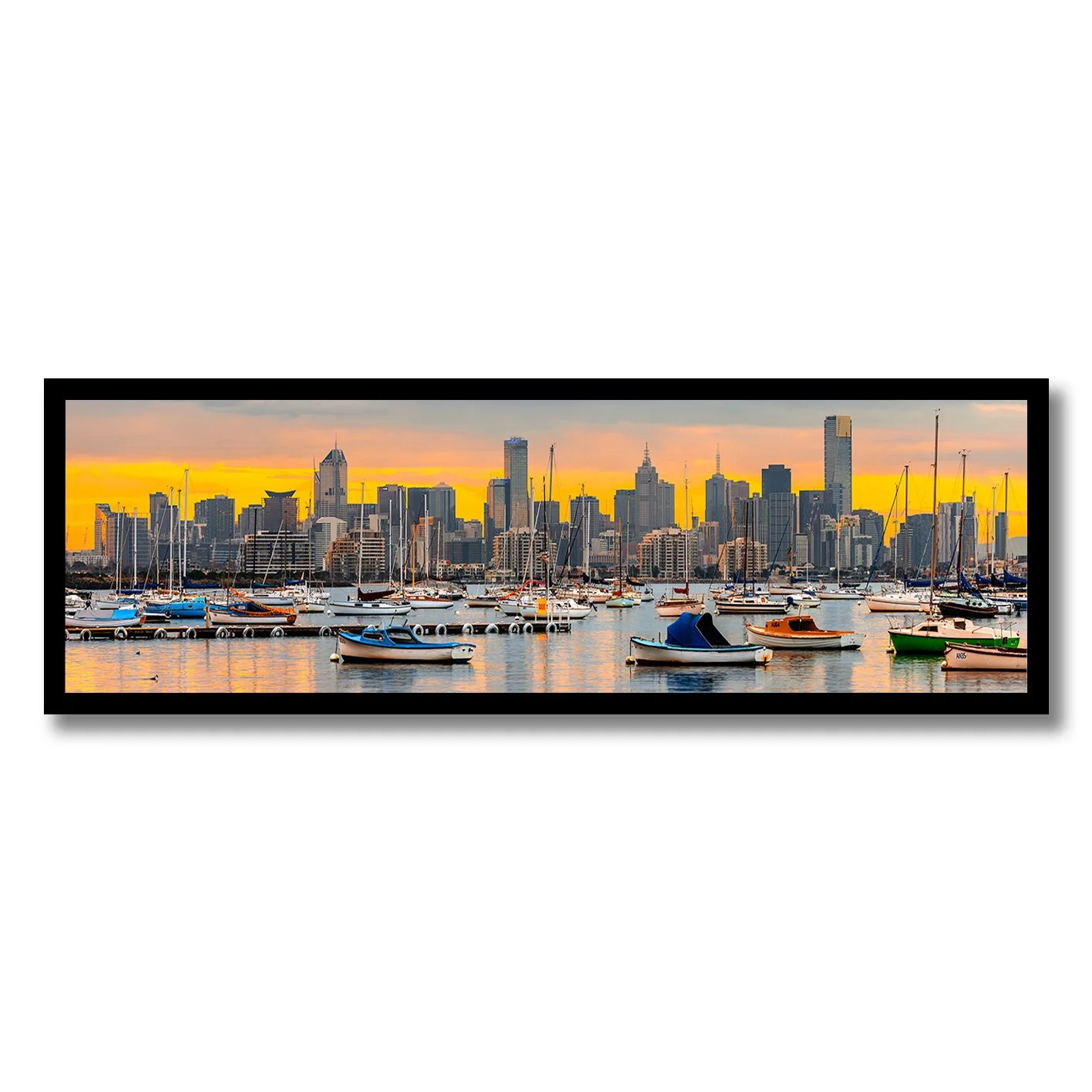 photograph of melbourne skyline from williamstown marina at sunset