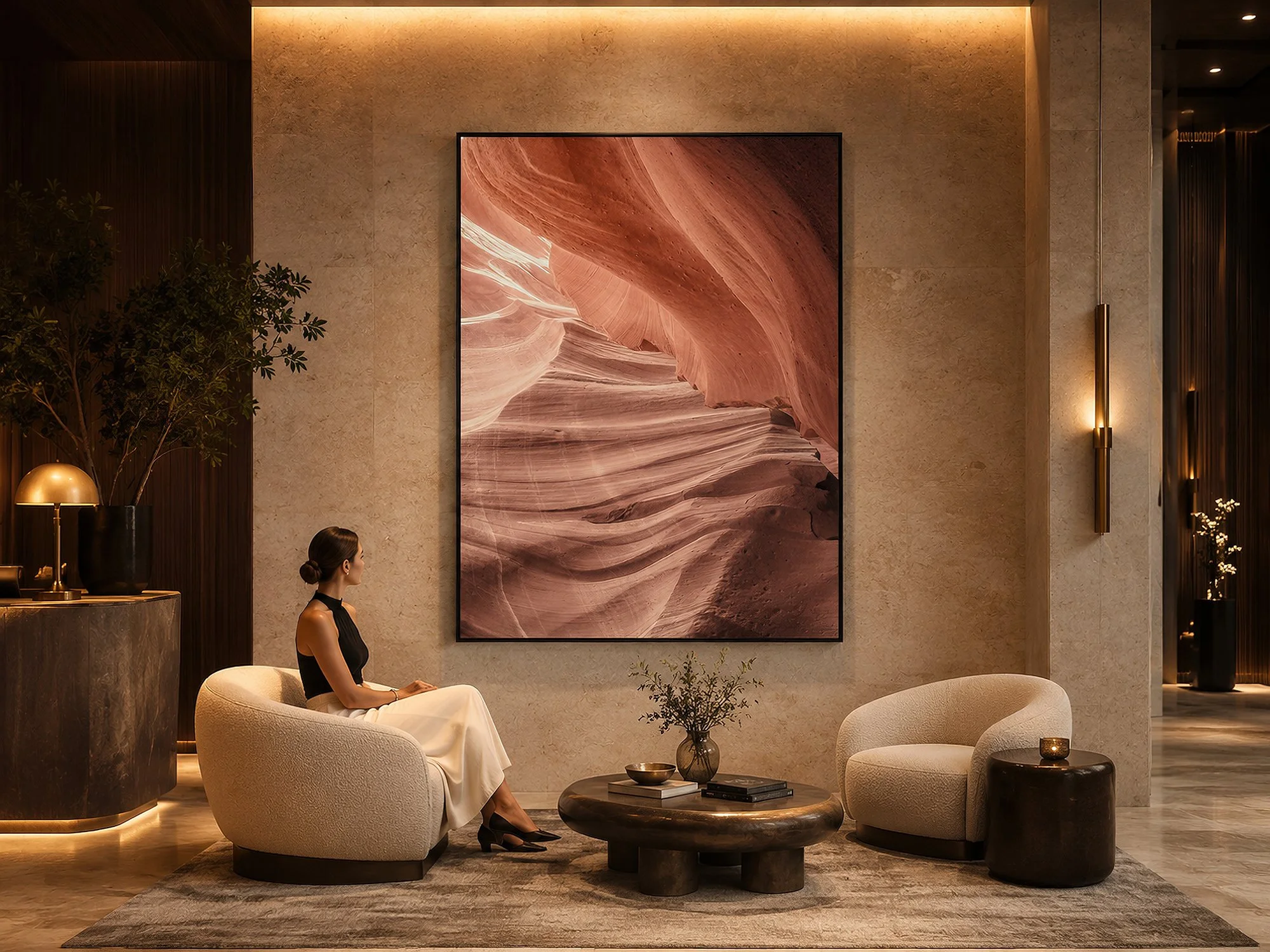 Framed Antelope Canyon photograph displayed in a luxurious contemporary lounge with a seated woman.