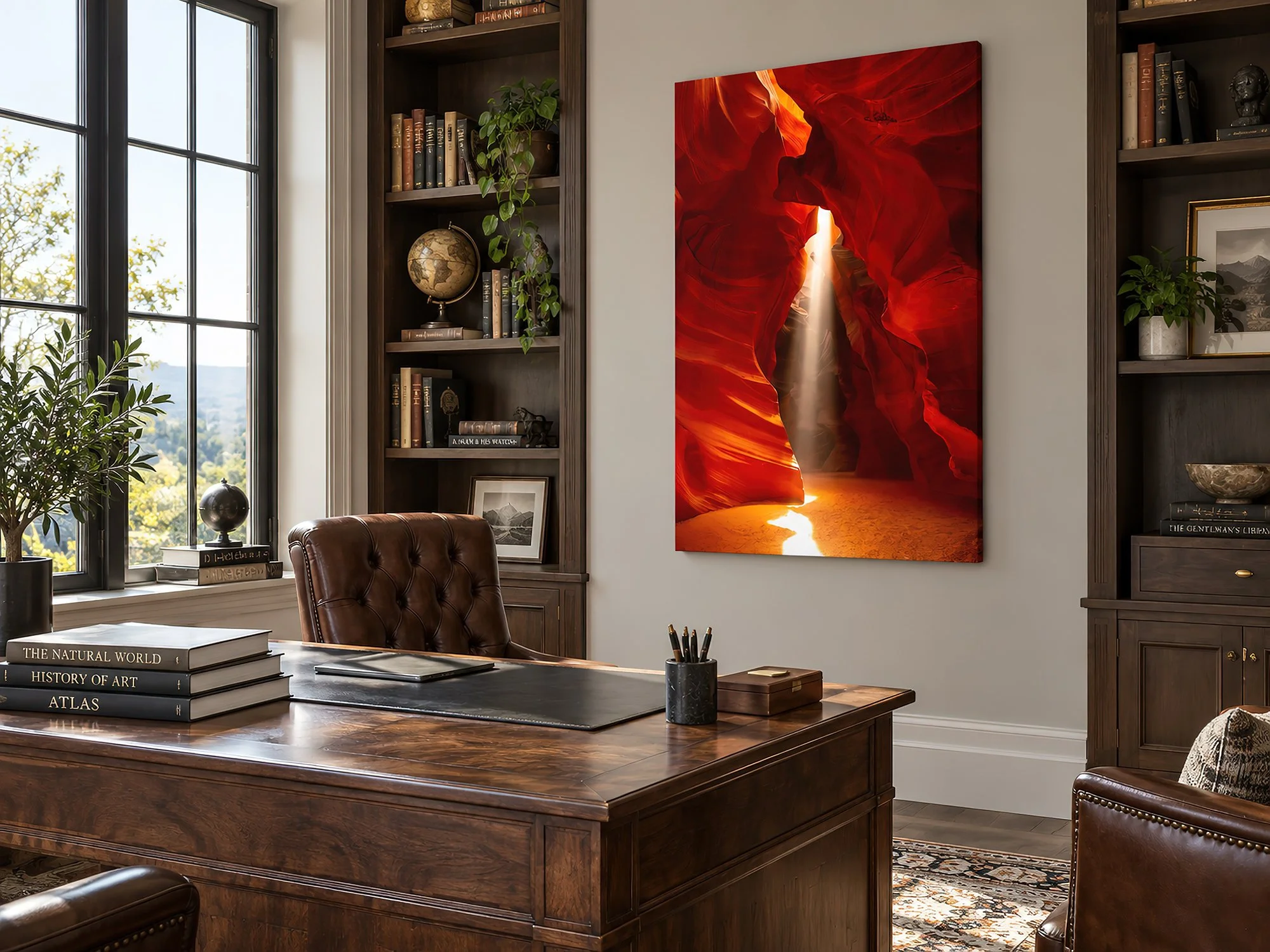 Sunlit men’s study with dark timber shelves, leather desk and chair, and a large 90 x 134 cm canvas print of a vivid red slot canyon with glowing sandstone curves and a shaft of light on the wall by Nick Psomiadis at NIKART Studio and Gallery