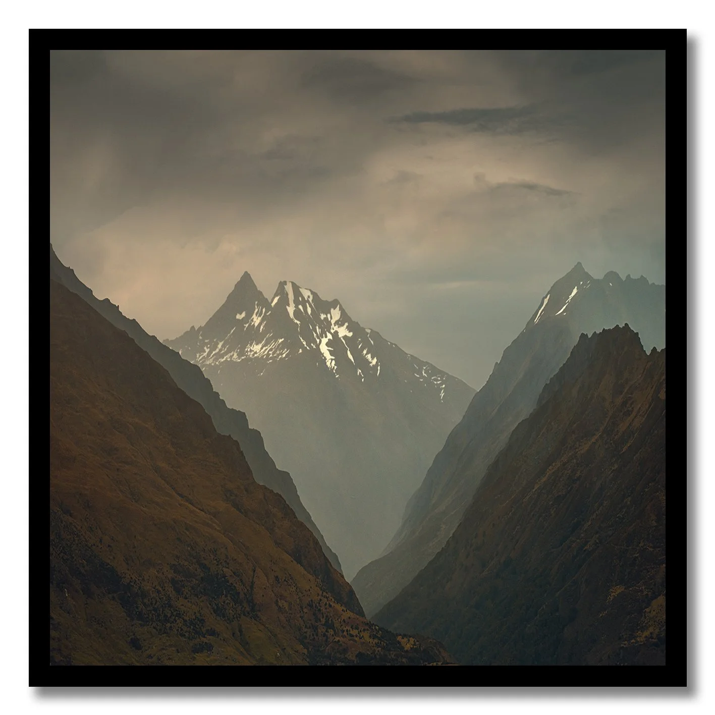 Mountain valley photography with snow peaks in New Zealand