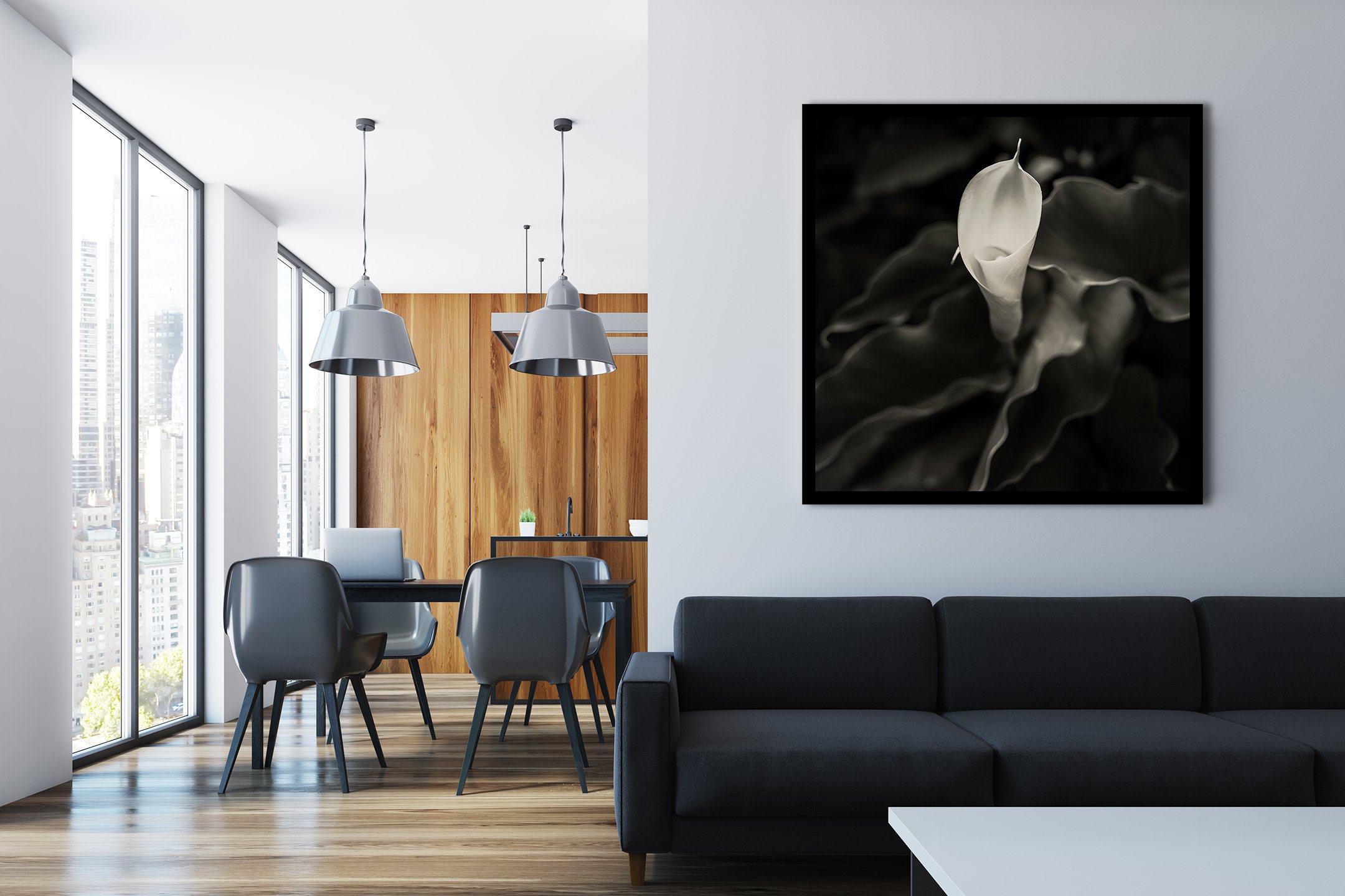 Modern living room with black sofa, black and gray dining chairs, high windows, hanging pendant lights, and a wall-mounted black and white floral art piece.