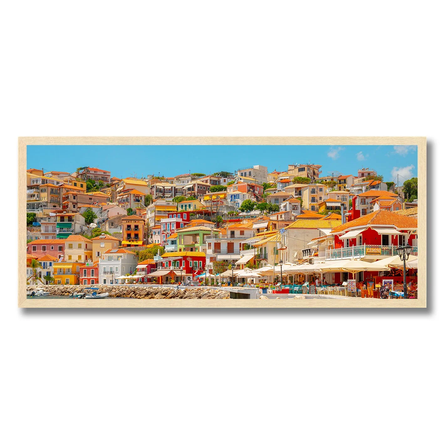 fine art photograph of colourful hillside buildings in parga greece under clear blue sky
